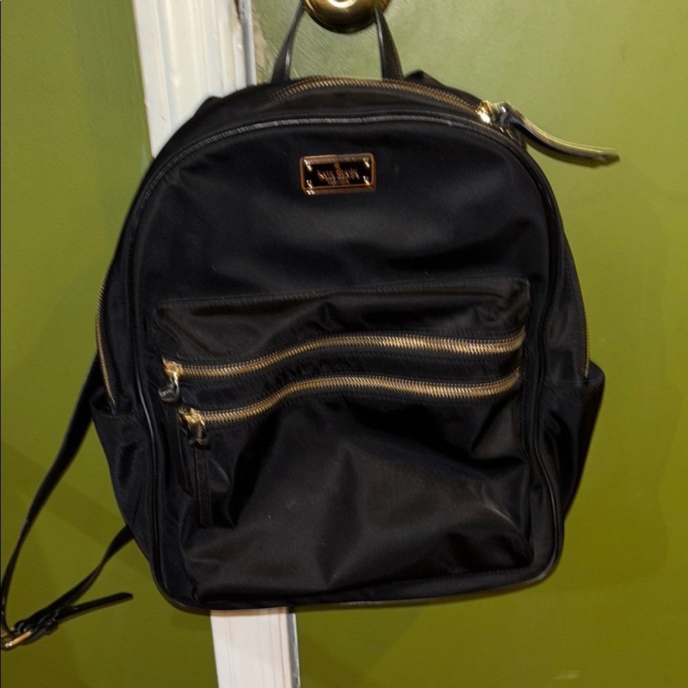 Black Backpack with Gold Accents